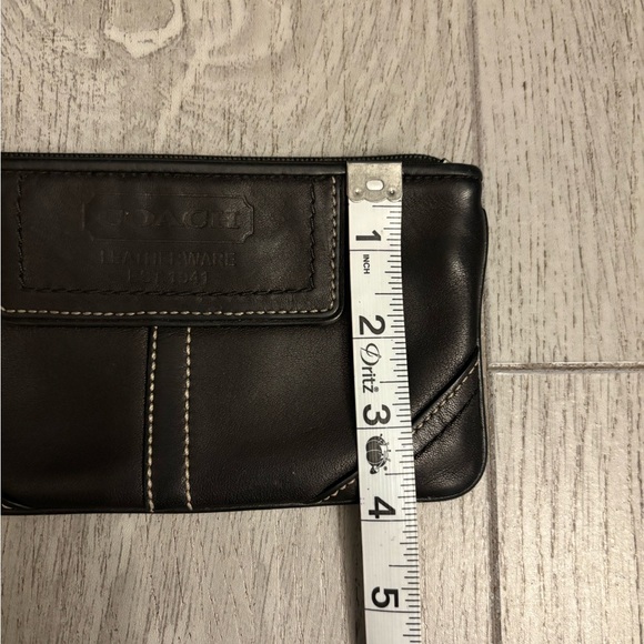 Coach wristlet in black leather. Hangtag present. EUC. - Picture 11 of 11